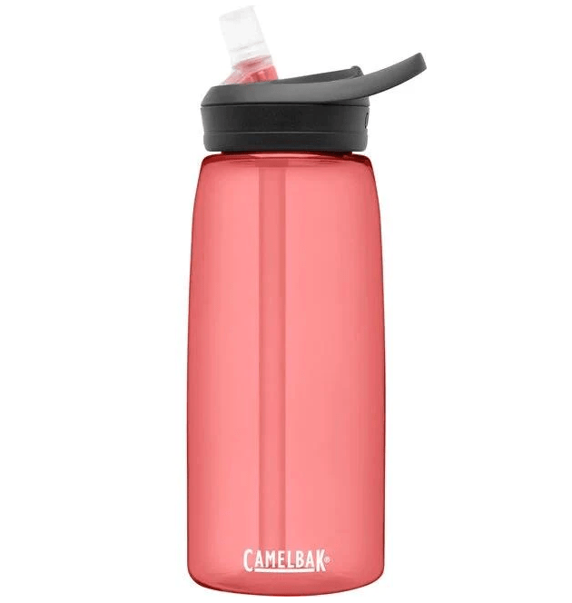 Light pinkish/melon colored bottle with clear bite valve and straw , black lid , camelbak logo in white letters