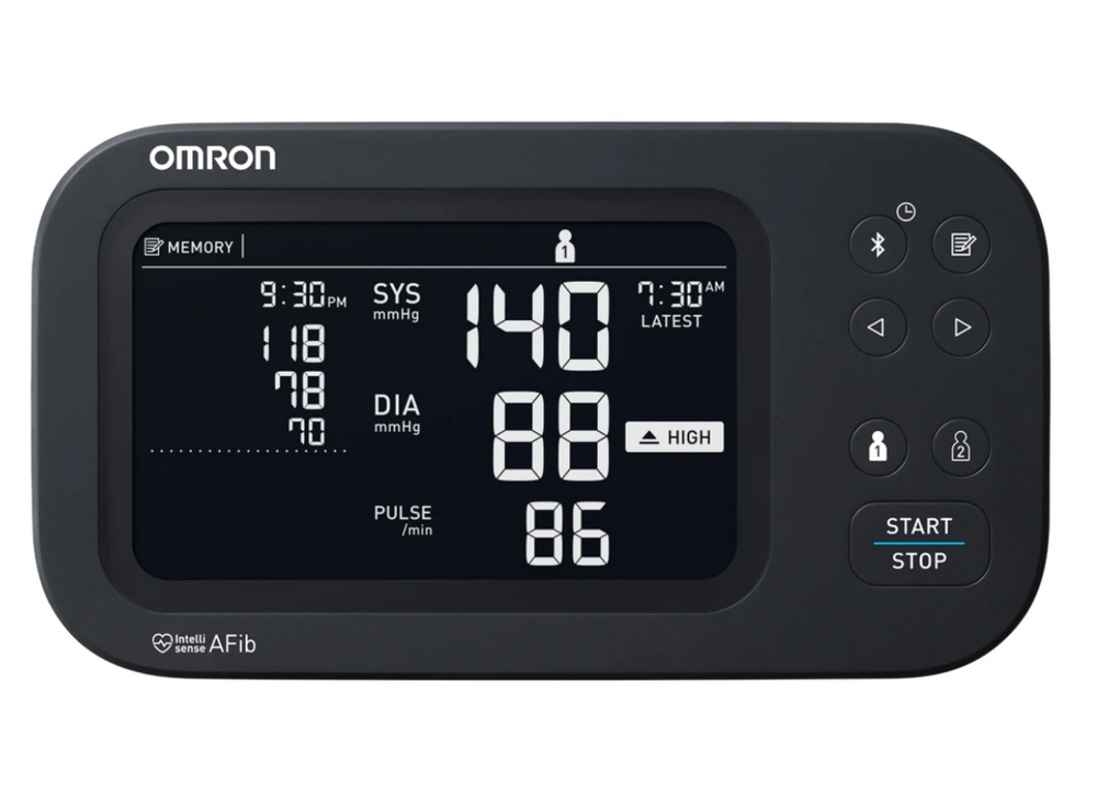 Omron blood pressure monitor with digital display on a white background