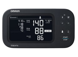 Omron blood pressure monitor with digital display on a white background