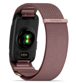 Garmin CiraO Smart Tag fitness tracker with a black heart rate sensor and a textured dusty rose fabric loop strap, shown on a white background.